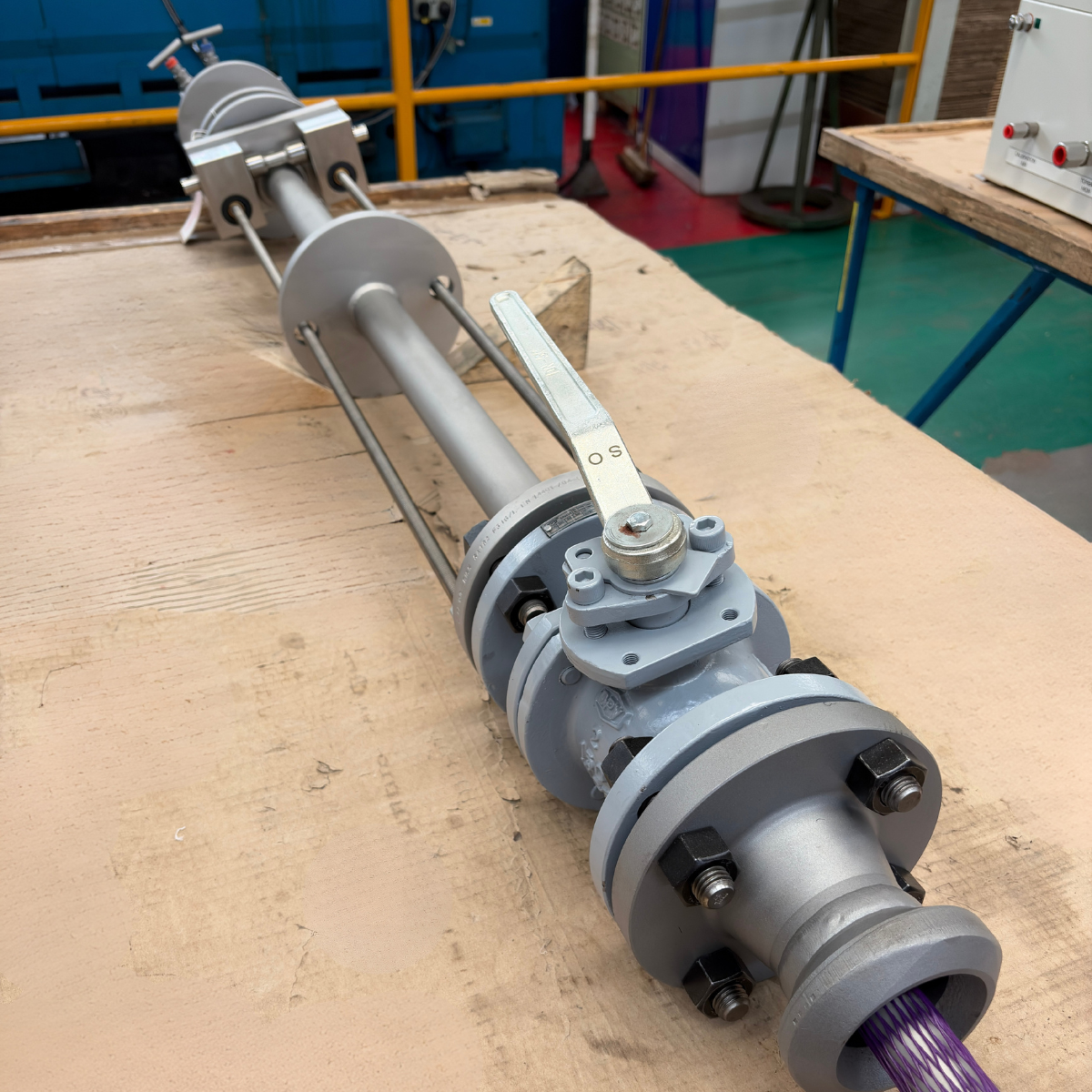 High pressure retractable averaging pitot tube assembly on a workshop bench