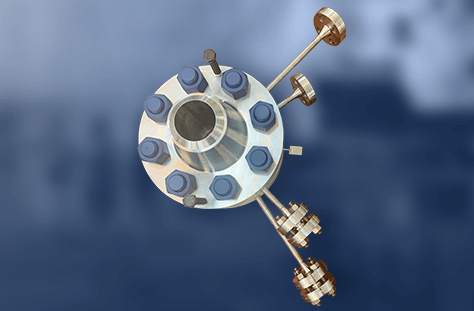 Stainless steel orifice plate assembly with blue bolts and connecting piping