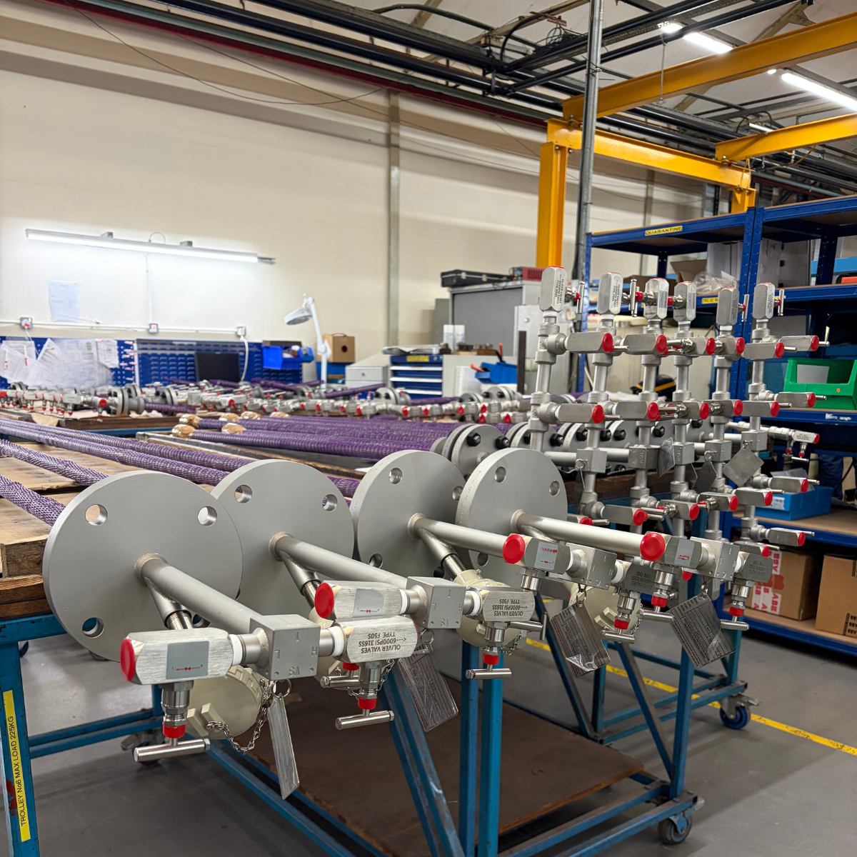 Averaging Pitot Tubes arranged on a production rack in the workshop