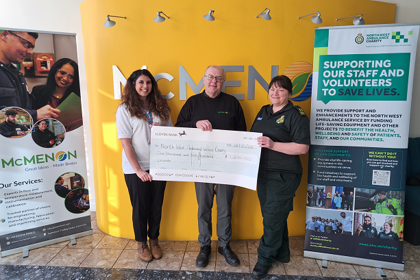McMenon Engineering hand over a cheque to NWAS Charity